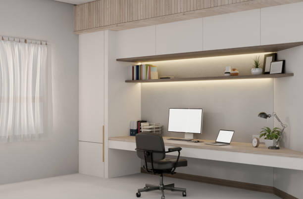istock A contemporary luxurious office features a computer and laptop mockup on a large desk. 2184670160