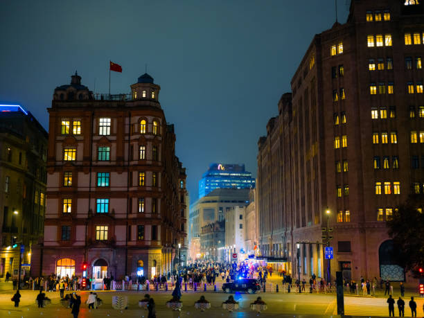 Crowded town square in The Bund in  Shanghai at night