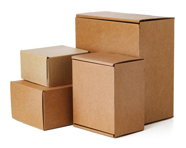 istock Stacked brown cardboard boxes in various sizes arranged on a white background 2184686872