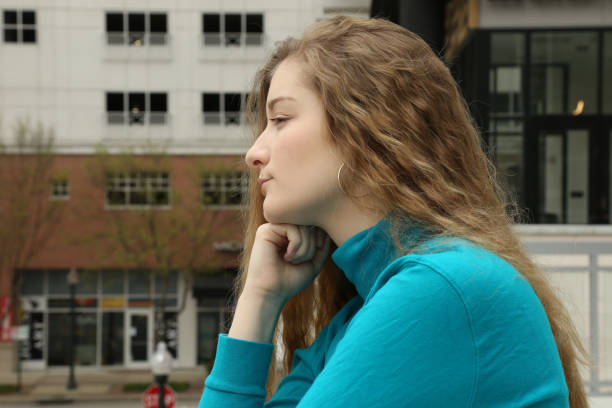 Teenaged girl with a serious expression