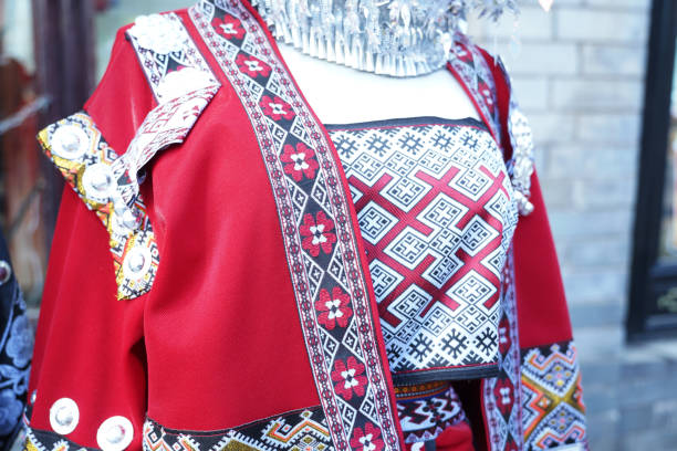 A close-up view of the collar of an authentic traditional garment, showcasing detailed and colorful embroidery, highlighting skilled craftsmanship.