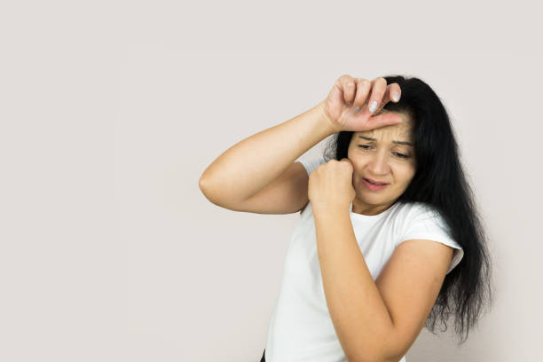 istock young woman in act to defend herself from somebody striking 2184695081
