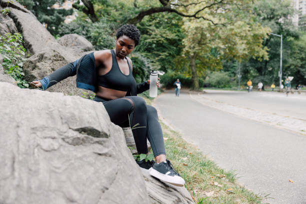 istock Woman cooling off after a jog in Central Park 2184701298