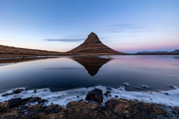 istock The famous Kirkjufell mountain with reflection 2184703617