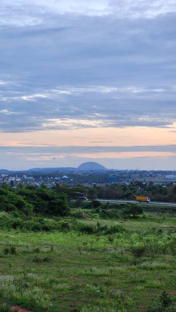 istock Scenic landscape with distant mountain and sunset sky 2184705501