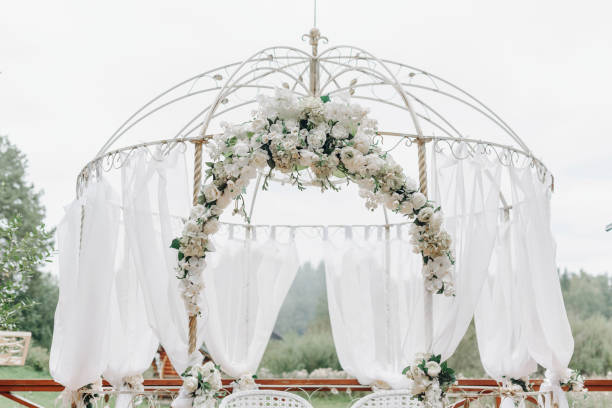 istock white metal arch for newlyweds 2184706229