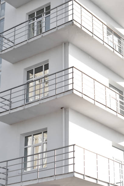istock modern black and white apartment building 2184706274
