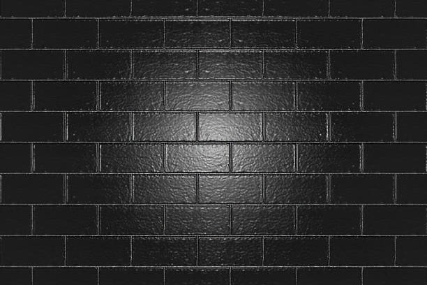 istock Background image of a black brick wall with a glossy surface 2184711683