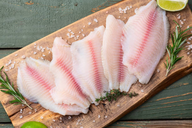 istock Raw tilapia fillet photography . Top view 2184711844