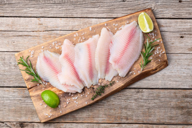 istock Raw tilapia fillet photography . Top view 2184711848