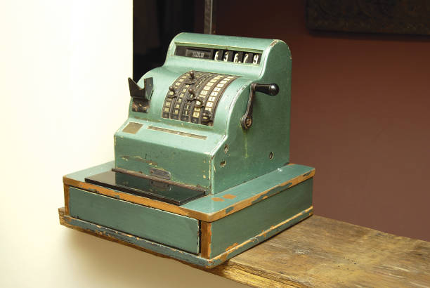 istock Green coloured antique cash register 2184717077