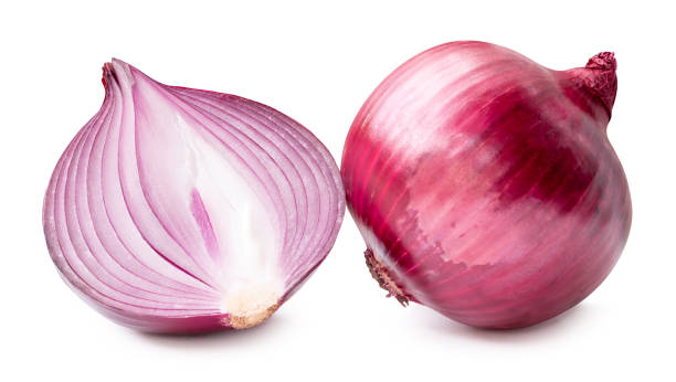 istock Side view of red onion or shallot with half in stack isolated on white background with clipping path 2184719399