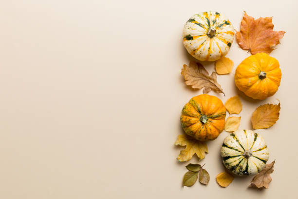 istock Autumn composition. Pattern made of dried leaves and other design accessories on table. Flat lay, top view 2184727040