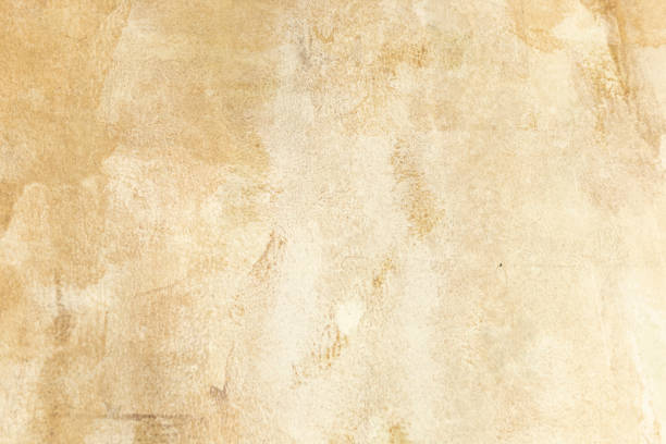 Sepia yellow wall,  with copy space stock photo.  Background, abstract texture. Empty old wall.  Big contrast, vertical photo