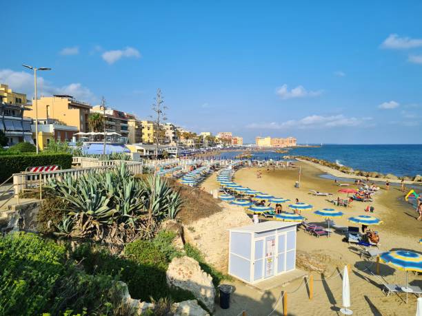 istock beach with umbrellas and sunbeds 2184728155