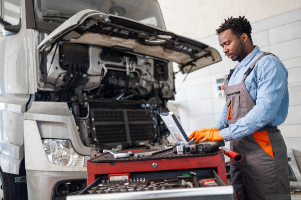 istock Repairing truck vehicle inside workshop. 2184728320