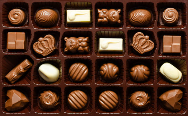 istock Assorted chocolate candies in a box. 2184735058