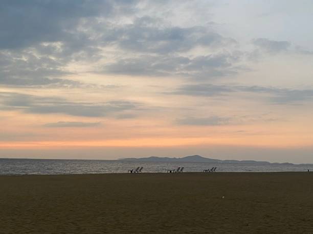 istock Chair on sunset beach sky view background 2184735314