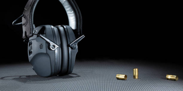 istock Brass next to shooting hearing protection 2184736249