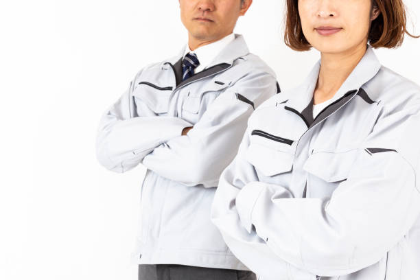 istock Men and women in work clothes with their arms folded 2184741801