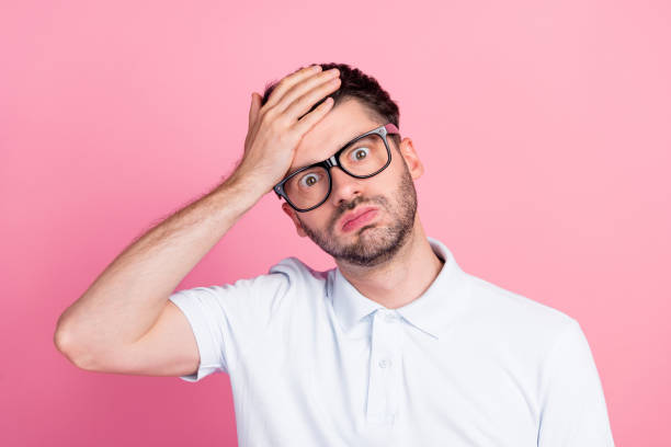 istock Photo of shocked representative guy touch hand forehead solving disaster problem isolated on pastel color background 2184746357