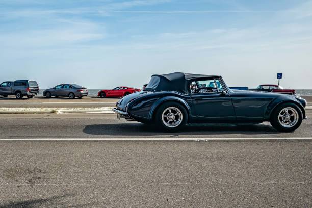 1962 Austin Healey Sebring 5000 Convertible Gulfport, MS - October 04, 2023: Wide angle side view of a 1962 Austin Healey Sebring 5000 Convertible at a local car show. gulfport florida photos stock pictures, royalty-free photos & images