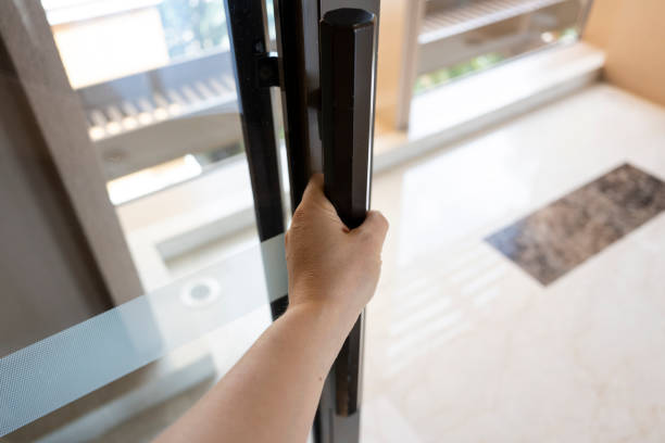 istock Metal handle for manually pushing glass door 2184758140