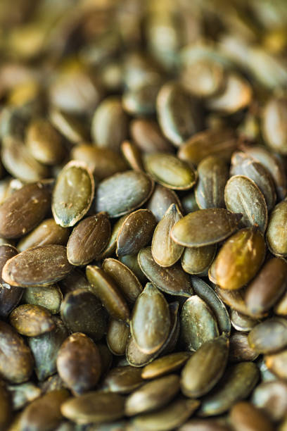 Fresh and wholesome organic pumpkin seeds packed with nutrients and a mild savory taste. Part of a food series.