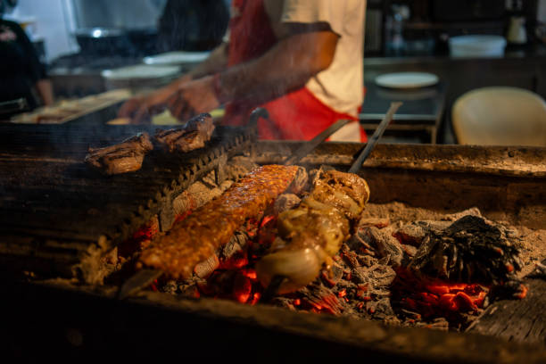 istock kebaps are on barbeque dishes are background focus on foreground chef is background horizontal food and beverage still 2184761960