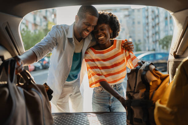 istock Happy couple bonds while packing for a trip. 2184765574