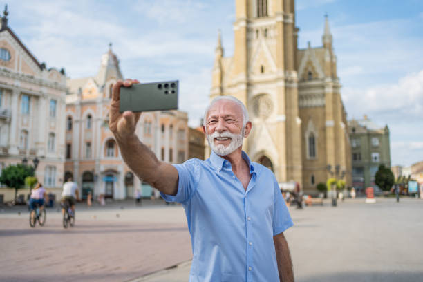 istock Senior man taking selfies in the city 2184766384