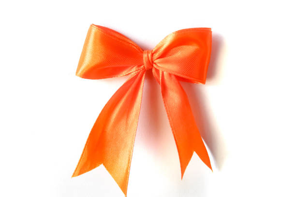 istock orange satin ribbon isolated on white background 2184769327