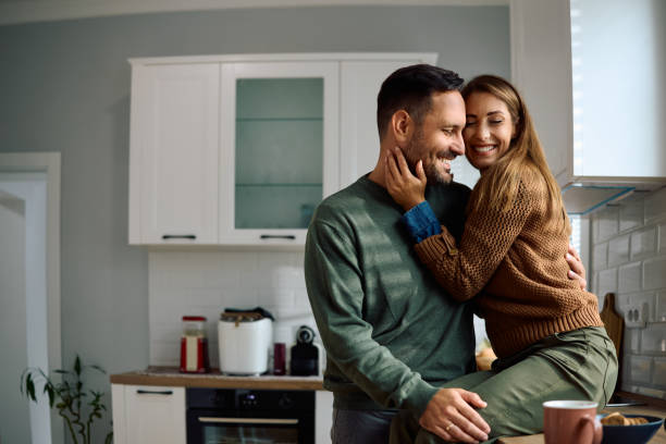 istock Affectionate couple enjoying in spending time together at home. 2184769759