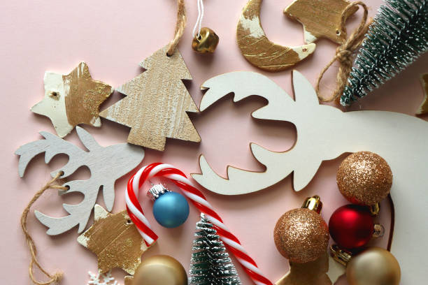 istock Christmas Ornaments On Pink Background 2184773125