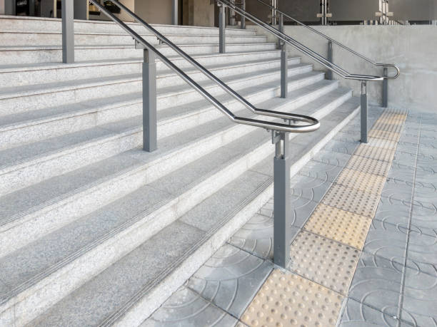 istock The concrete stairs with stainless steel handrails. 2184773604