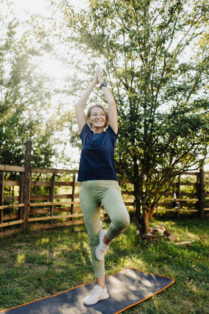 istock Shot of a handsome woman stretching before exercising outdoors alone 2184780272