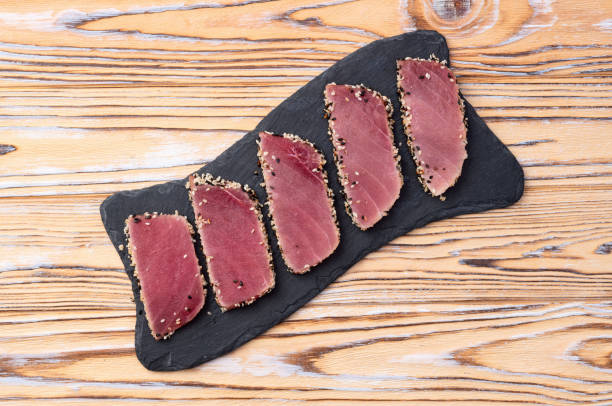 istock Sliced tuna steak with sesame photography . Top view 2184789797