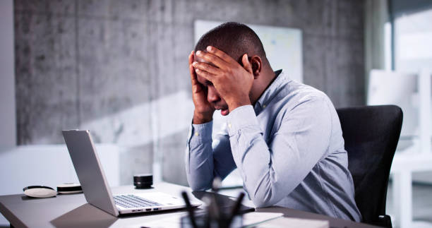istock Stressed Sick African American Employee Man 2184790829
