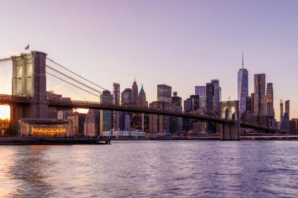 istock A panoramic sunset view of the Brooklyn Bridge stretching towards Manhattan 2184792970
