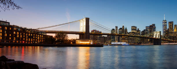 istock A panoramic sunset view of the Brooklyn Bridge stretching towards Manhattan 2184793039