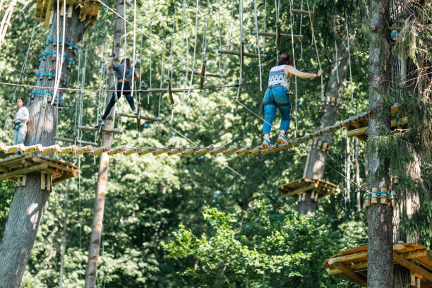 istock Experience an exhilarating Adventure in the Aerial Tree Ropes Course unlike any other 2184794267