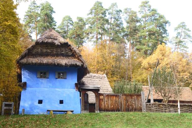 istock Old romanian peasant house in an autumn setting 2184802816