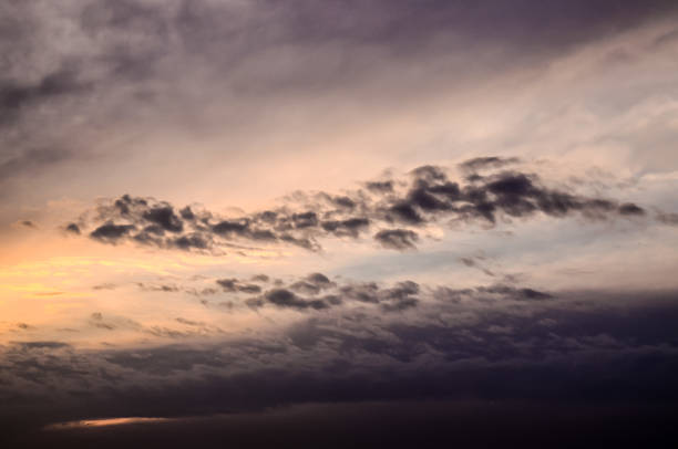 istock The sky is cloudy and the sun is setting 2184804403