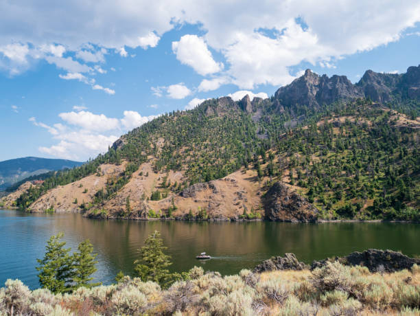 istock A boat floats on a mountain lake in idaho 2184804951