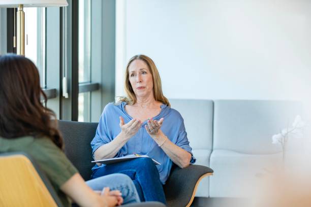 istock Counselor giving important advice to patient 2184805799