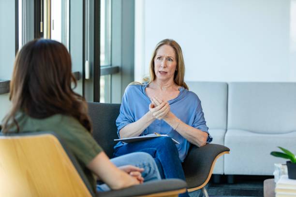 istock Serious female counselor gives advice 2184805802