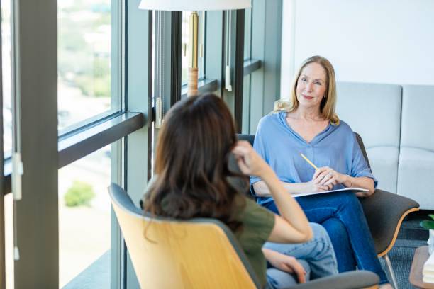 istock Caring attentive counselor listening to patient 2184805808