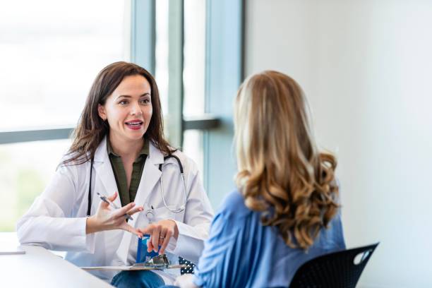 istock Doctor giving advice to patient 2184805835