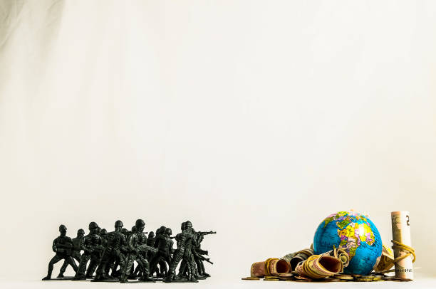 istock A group of soldiers are lined up in front of a globe 2184807340