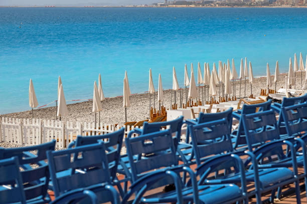 istock Beach umbrellas not yet open in Nice, France 2184808803